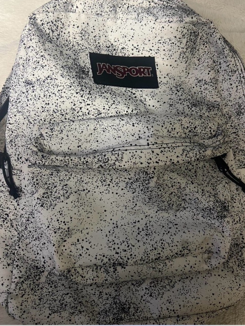 Jansport White Backpack with Black Speckle Print